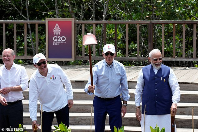 Keep digging!  President Biden joined Australian Prime Minister Anthony Albanese and Indian Prime Minister Narendra Modi for a mangrove sapling planting event at the end of the G20 summit in Indonesia