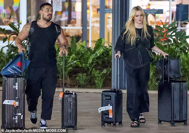It was back to reality for Simone Holtznagel and Jono Castano on Thursday as they flew back to Sydney sporting matching black outfits after their romantic holiday in Bali