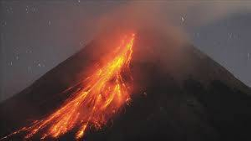 Mount Merapi in Indonesia spews lava onto its slopes during an effusive eruption - AFP