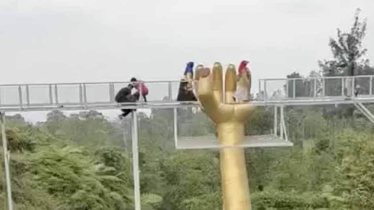 Tourist dies and three others are injured when 30ft-high glass walkway shatters at Indonesian beauty spot